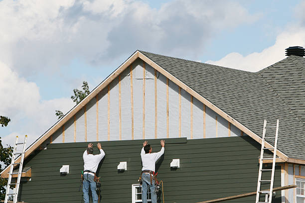 Professional Storm Damage Siding Repair technician working in Glyndon, MN